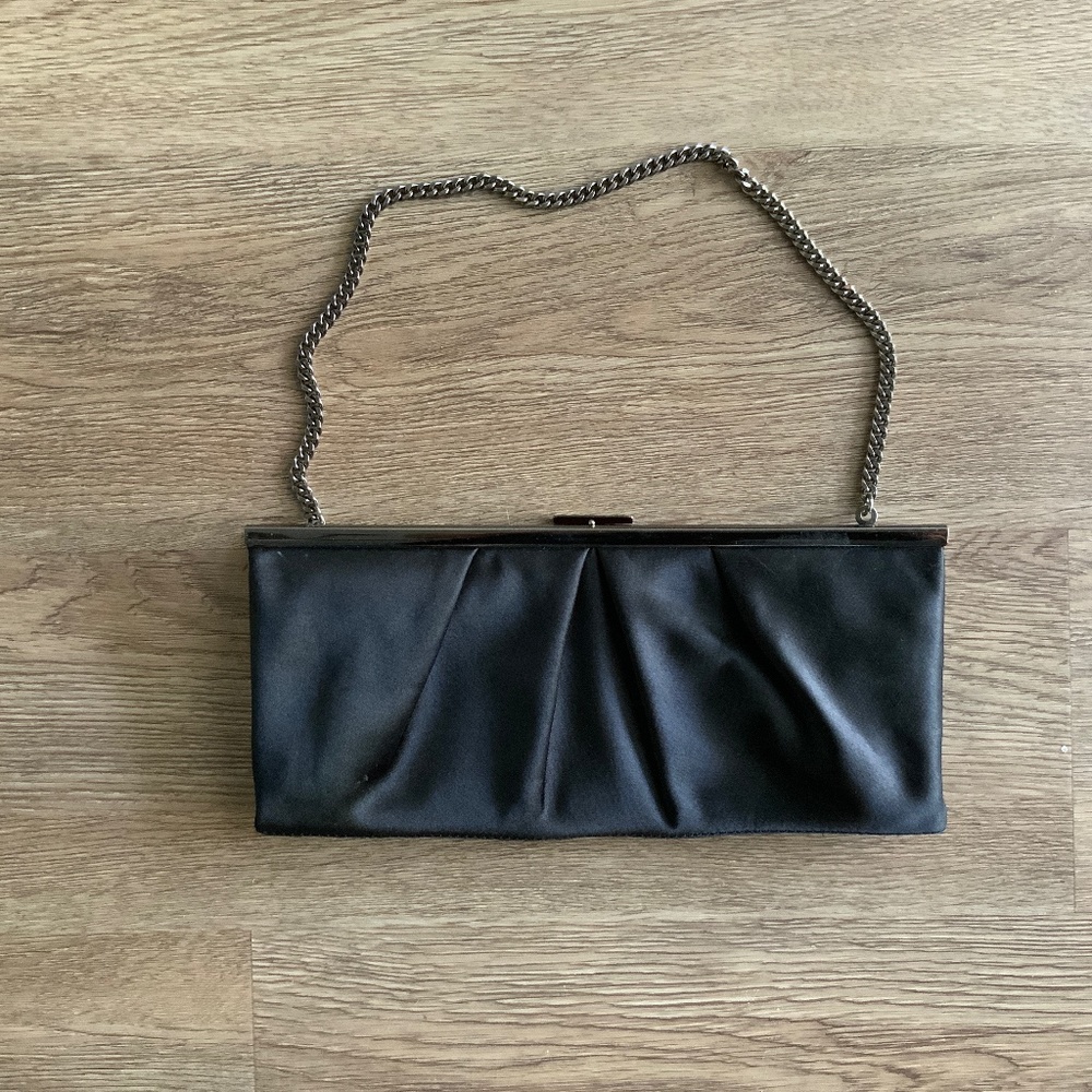 Black satin clutch purse.